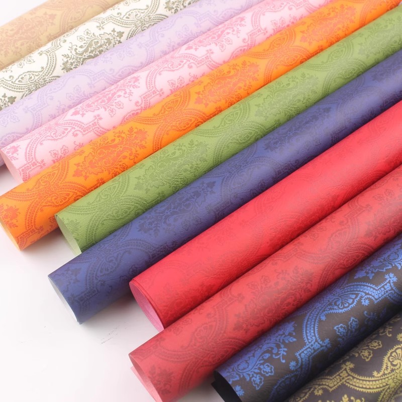 120g de papel especial en relieve papel de arte de red de red de impresión de papel en relieve de color papel de embalaje de libro rojo pequeño