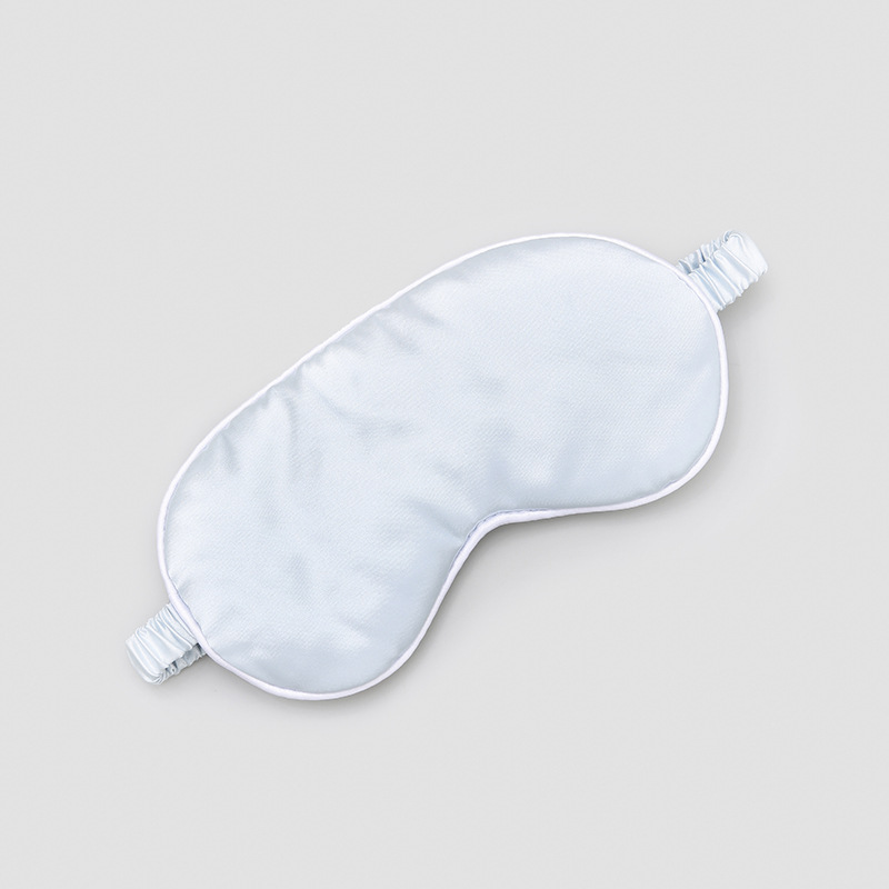Máscara de ojo de seda artificial máscara de ojo de viaje de aire al por mayor Fábrica de sombreado correa elástica de viaje almuerzo máscara de ojo borde blanco