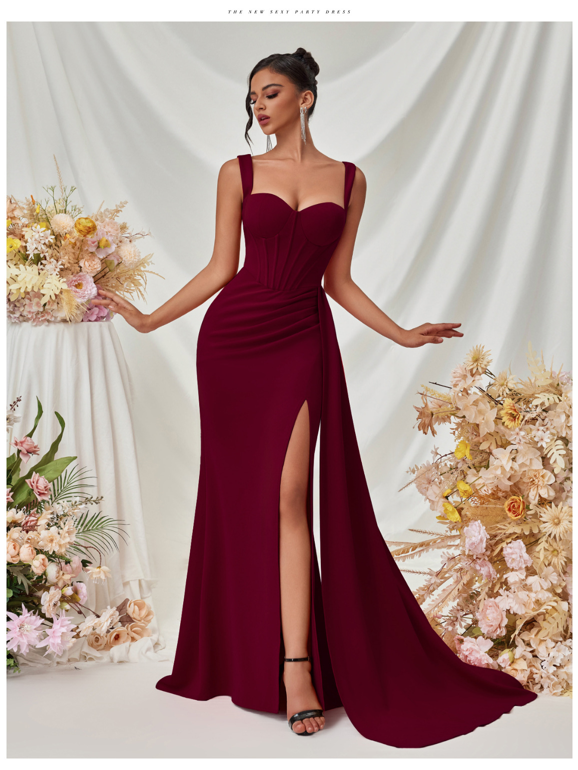 Nuevo vestido de noche sexy dividido de estilo europeo y americano, vestido largo con tirantes delgados de cadera de temperamento femenino de alta gama en stock