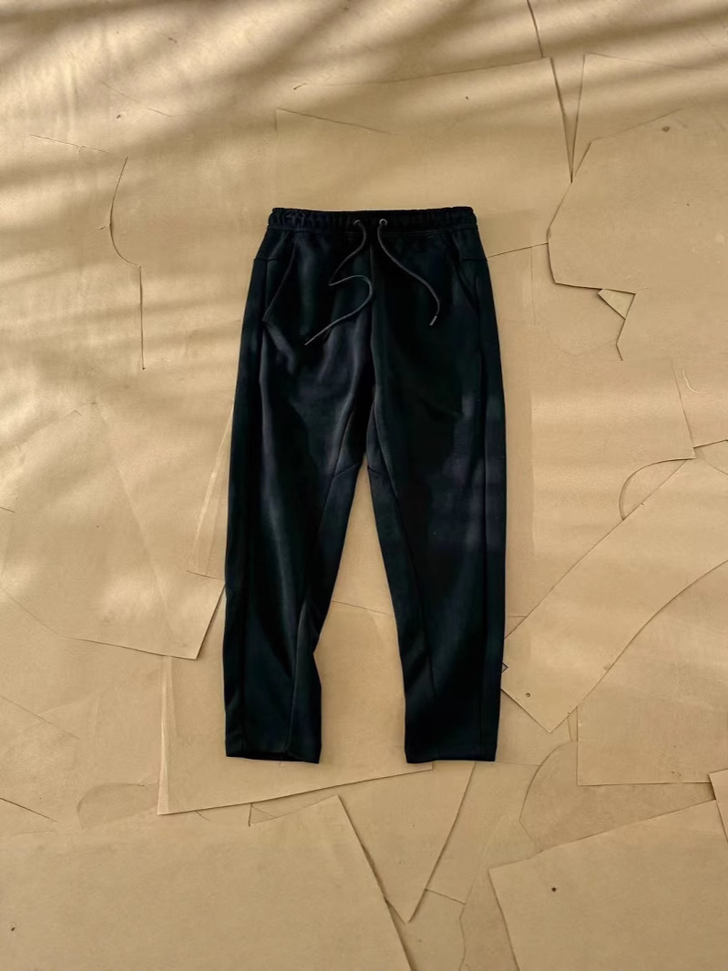 Nuevo hombre deportivo ocio al aire libre versátil punto suelto pantalones largos de piernas largas pantalones 211