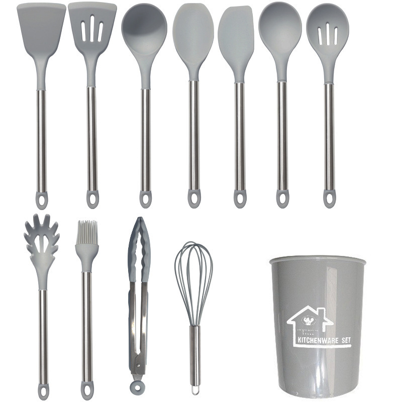 Cuchara de sopa de espátula de silicona transfronteriza Juego de 23 piezas de sartén antiadherente Pala de silicona especial Juego de utensilios de cocina de silicona de grado alimenticio al por mayor