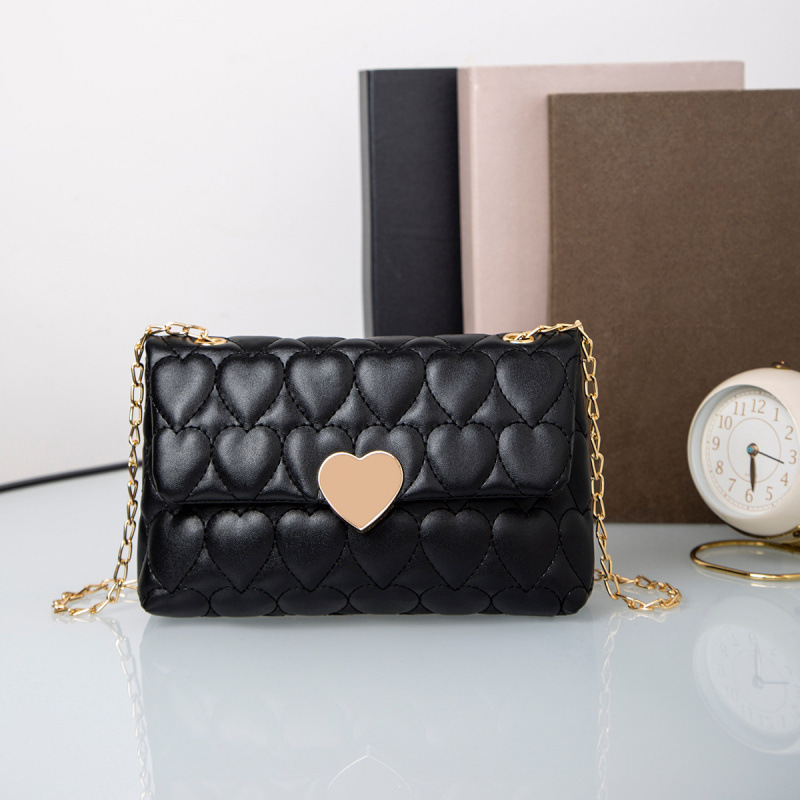 Bolsa de hombro de cerradura de corazón de melocotón comercio exterior al por mayor 2025 primavera y verano nuevo bolso multifuncional de mujer, bolso de mujer interior