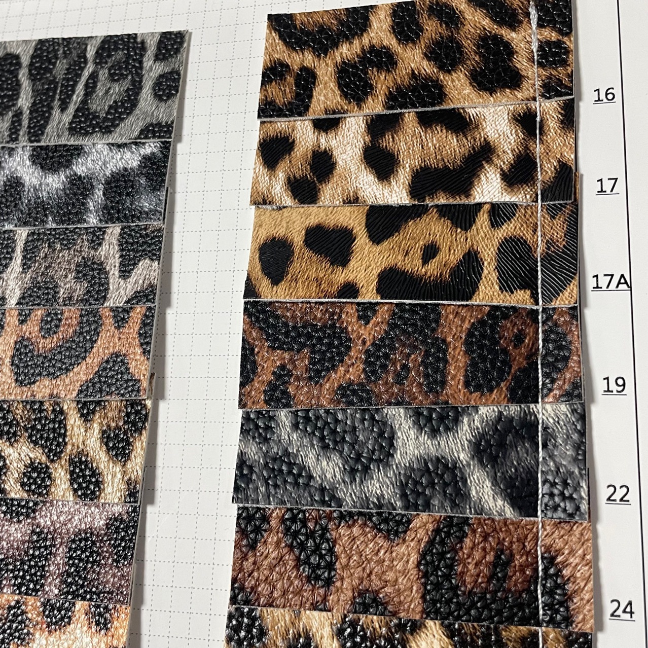 新款豹pu人造皮革面料U131帽子鞋材印花面料产地现货批发冬季