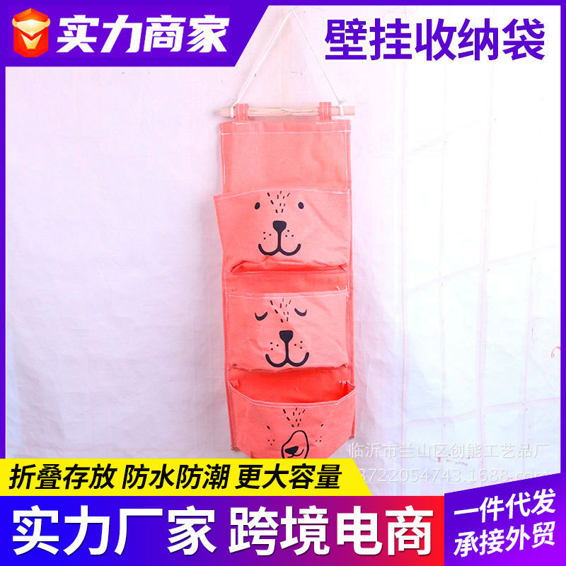 Expresión de dibujos animados de algodón y lino Bolsa colgante de almacenamiento de una pieza de tres bolsillos Bolsa colgante de almacenamiento de semicírculo Bolsa colgante decorativa Bolsa colgante