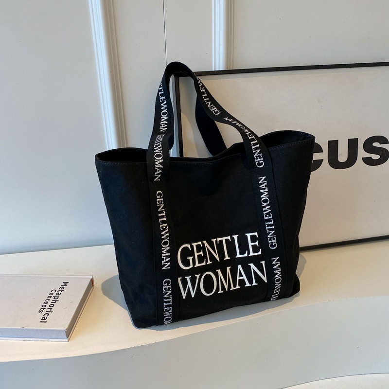 タイのキャプテンウーマン大アルファベットプリントキャンバスバッグ2024新作質感カジュアルファッションショルダーバッグ