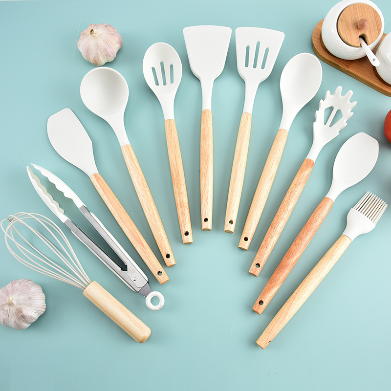 Juego de utensilios de cocina de comercio exterior pala de cocina cuchara de silicona caliente combinación de herramientas de utensilios de cocina de 19 piezas con traje de peso de cubo de almacenamiento