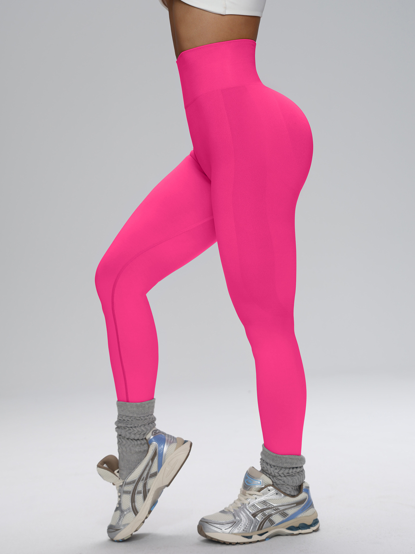 Europa y los Estados Unidos sin costuras cintura alta pantalon de gimnasio de alta cadera para mujeres corriendo al aire libre apertado nueve pantalones de pelusa de miel
