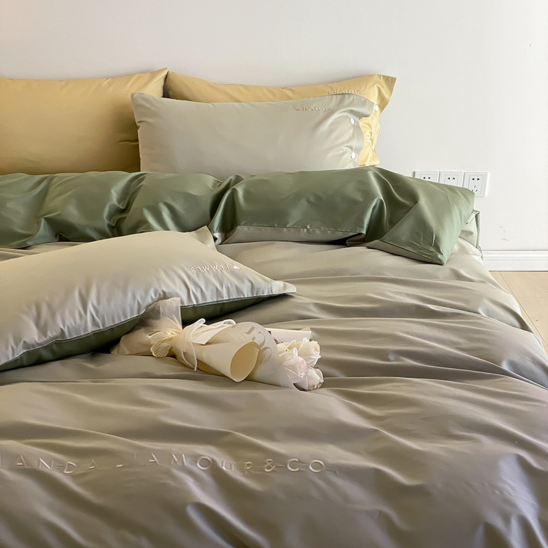 De alta gama de 100 de algodón de fibra larga de satén de color a juego de cuatro piezas conjunto de lujo de luz de algodón puro edredón cubierta de cama hoja de cama simple ropa de cama francesa