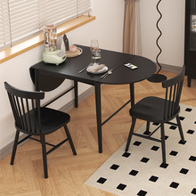 全实木餐桌可折叠家用吃饭桌子黑色轻奢现代椭圆小户型餐厅饭桌
