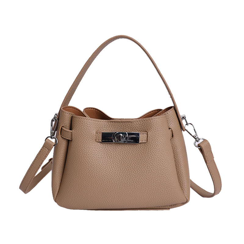 Coreano de nicho de alta calidad canasta de verduras, bolso de cubo de mano para mujeres 2026 nuevo estilo extranjero, lujo ligero y versátil bolso de mochila