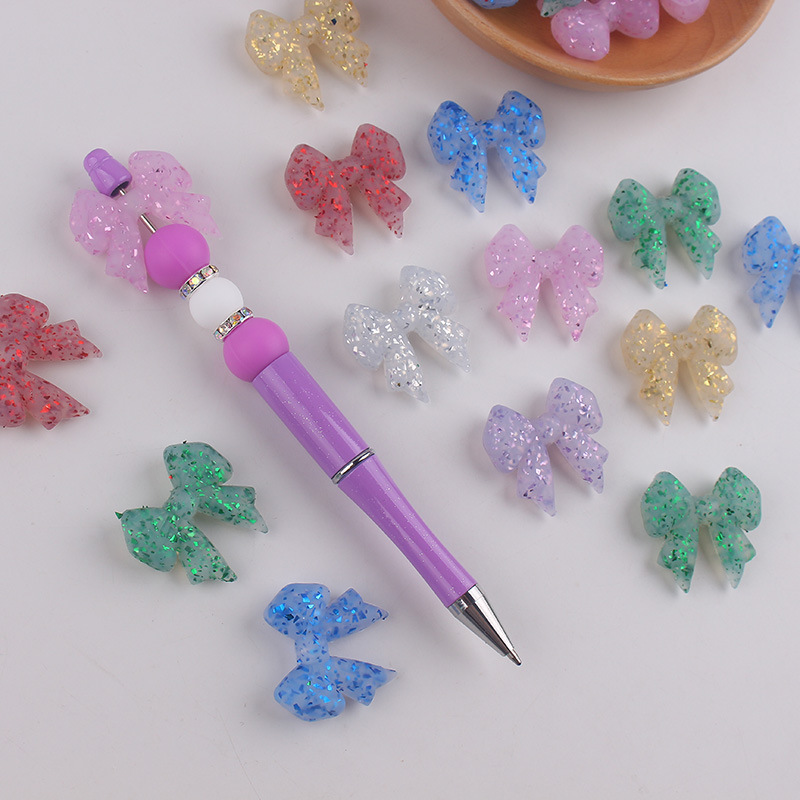 Nuevo arco brillante perlas de silicona para bebés pequeños collar de dentín accesorios de cuentas de caricatura perlas de silicona al por mayor