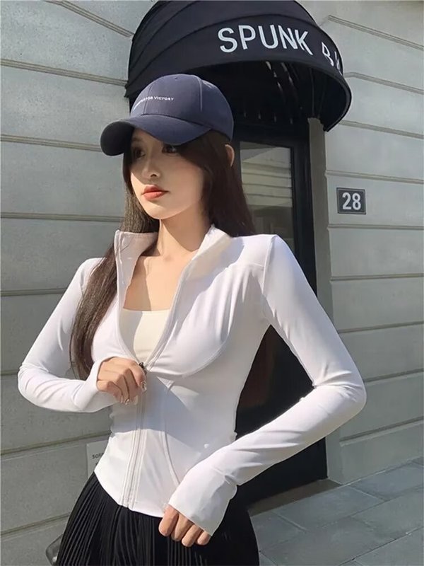 大きいサイズのスポーツの日焼け止めの長袖のショートコートの女性の夏の修身はやせている純色を現します。|undefined