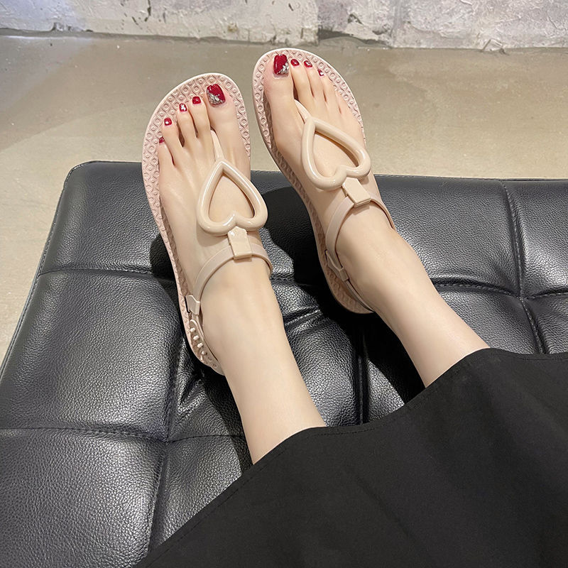 Sandalias planas con chanclas de verano para mujeres francesas 2020 nuevas sandalias coreanas en espina zapatos de playa romanos de todo fósforo para mujeres