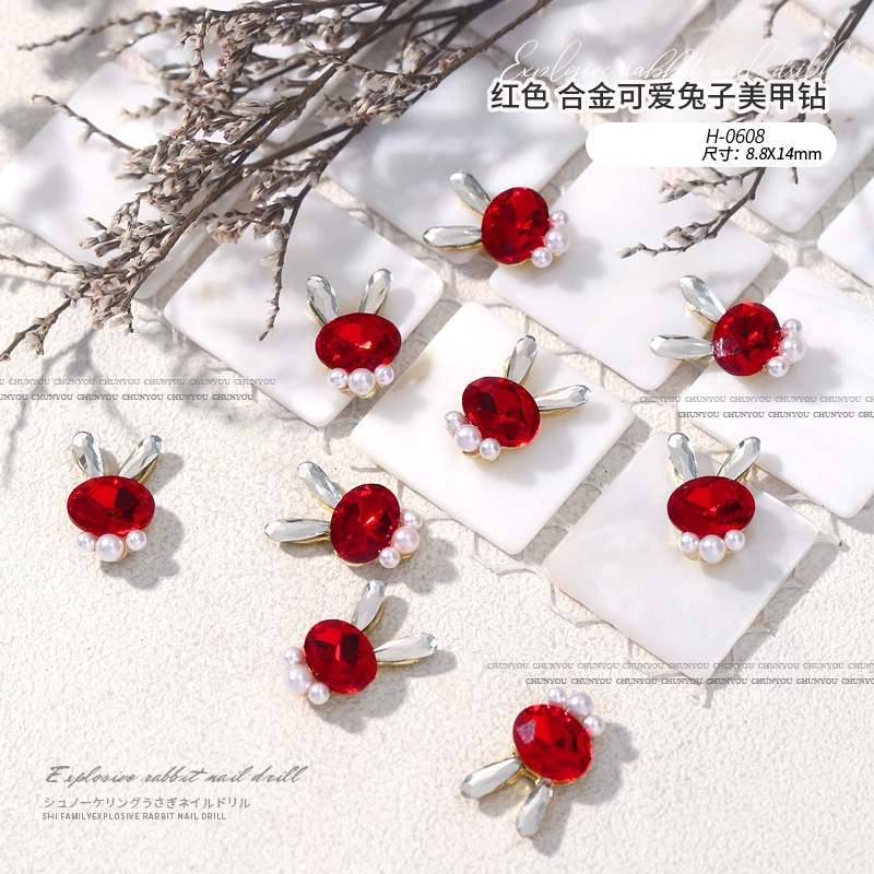 Nuevo acabado lindo flash conejo aleación diamante conejito cabeza perla pila diamante combinación manicura uñas joyería diamante