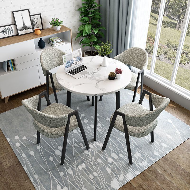 Imitation white marble table + floral linen chair