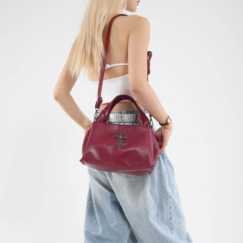 Bolso de textura transfronteriza 2025 verano nuevo bolso cruz bolso de hombro bolso de mensajero punk fresco mujer