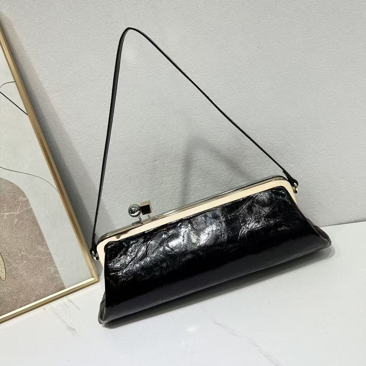 新款小众jacquemus长条法棍包高级感金口夹子包手拿单肩腋下包女