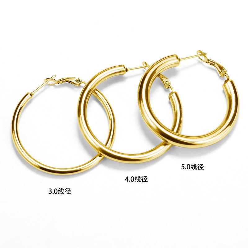 Venta caliente transfronteriza de acero de titanio personalidad simple alambre grueso diámetro titanio acero hueco pendientes exagerados grandes pendientes fábrica al por mayor