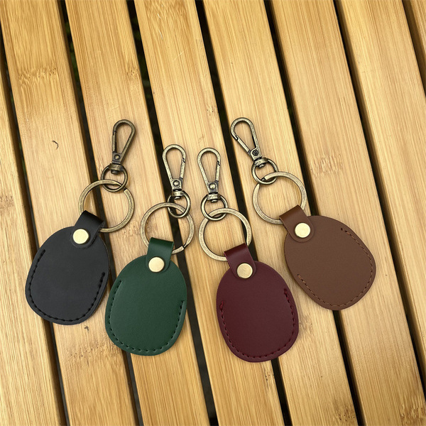 Spot is suitable for AIRTAG leather keychain protective cover AIRTAG…