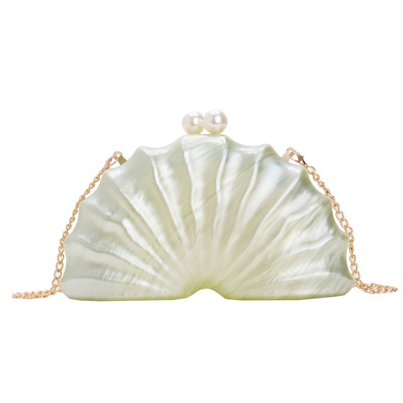 Europa y los Estados Unidos nuevos paquetes de cena de damas de hombro único en forma de concha acrílica de mano de lujo ligero paquete de moda de noche