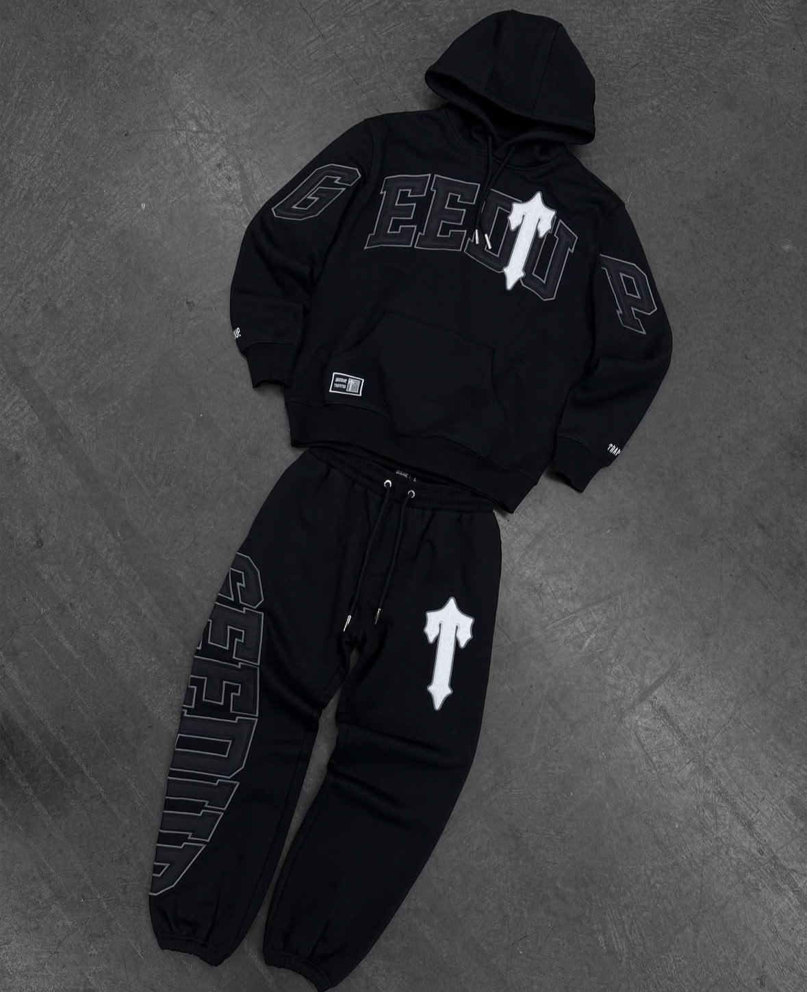 Nueva marca de moda europea y americana traje de suéter estampado de otoño e invierno personalidad calle suelta ropa deportiva casual al por mayor para hombres y mujeres