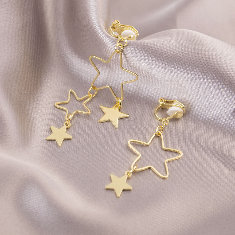 Pequeño incienso, clip de oreja de estrella de cinco puntas hueca, sin orejas, lujo ligero, pendientes de moda de alta gama, estrellas, joyería de temperamento simple