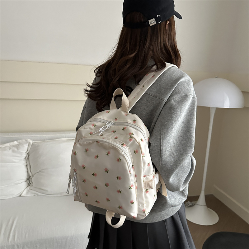 2025 primavera nueva moda coreana simple mochila de hombro casuales flores frescas lindas dulces mochila de estudiantes