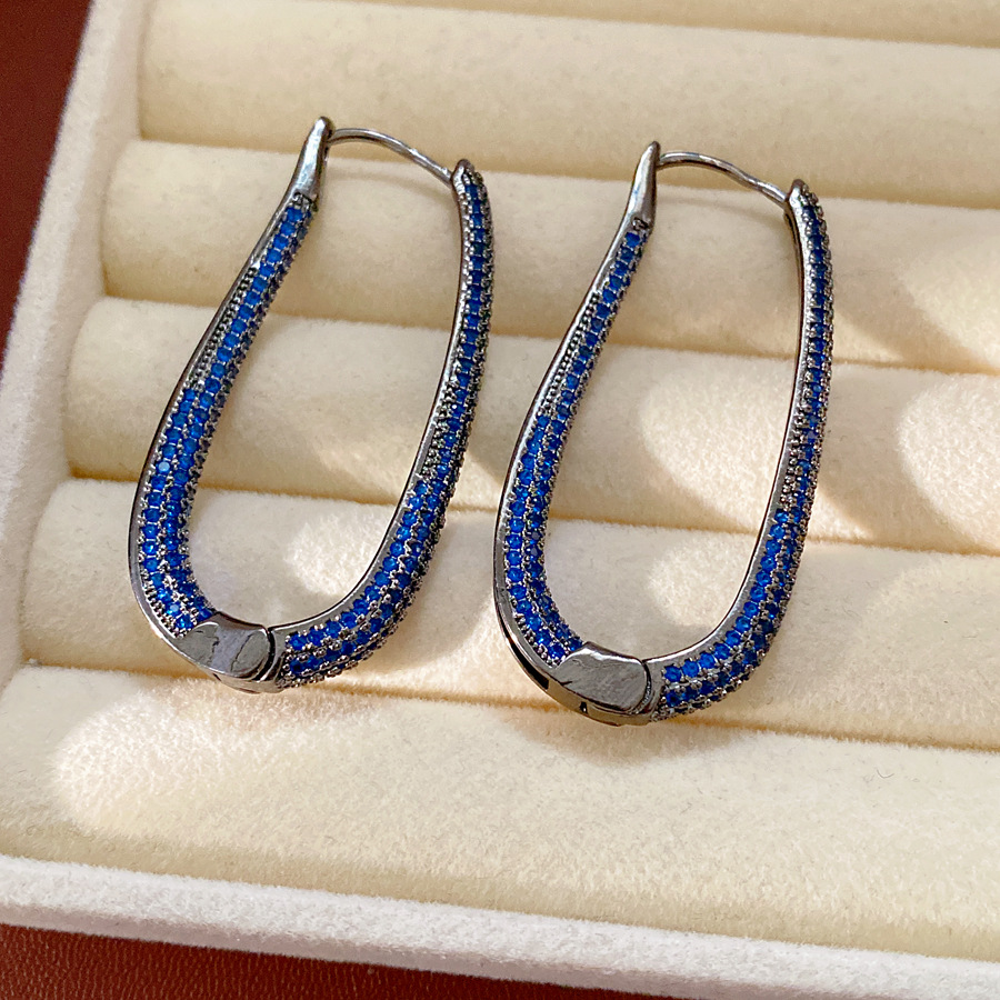 Medieval vintage zircón oval pendientes de estilo retrógrado personalidad pendientes ligeros de lujo alta sensación auriculares al por mayor