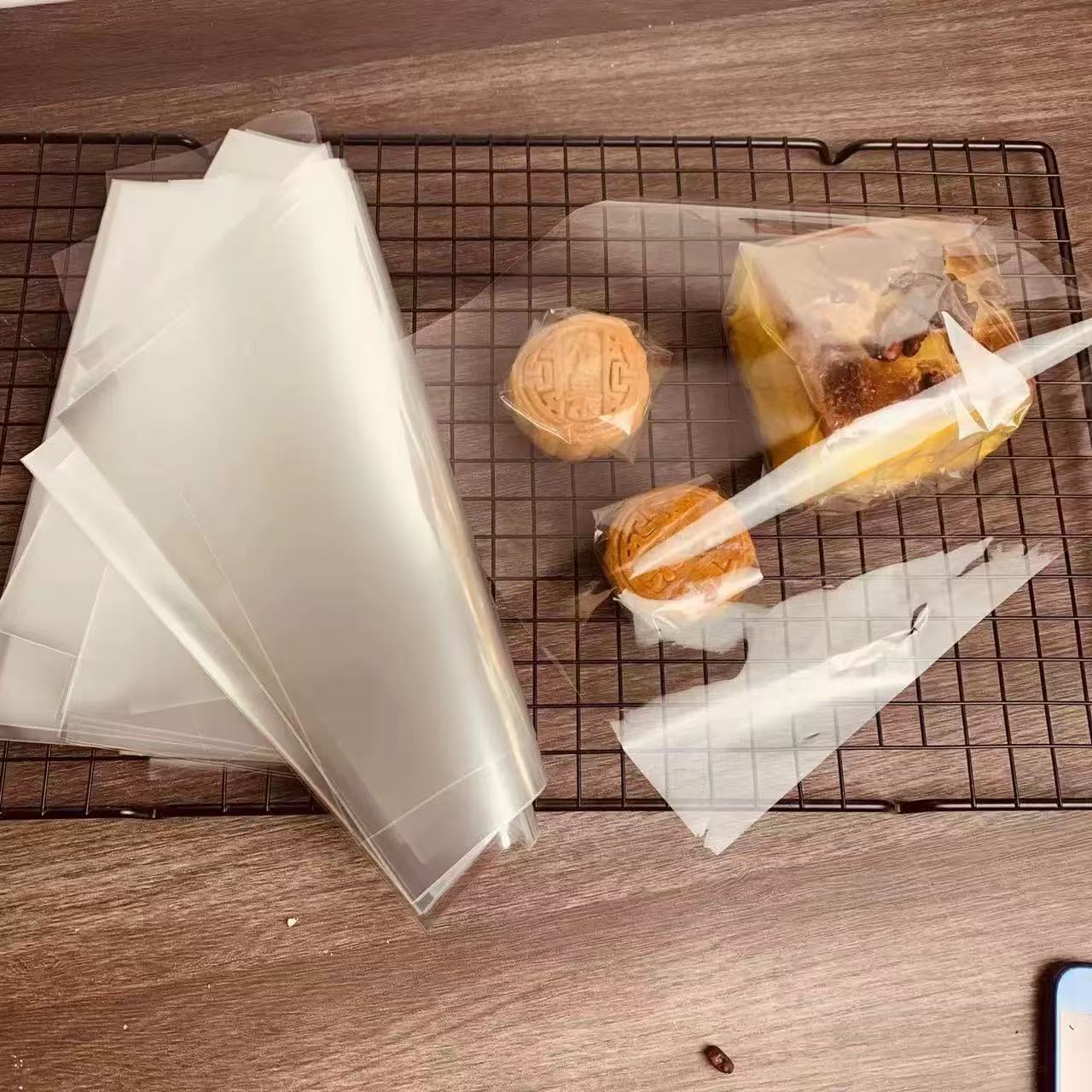 Papel de vidrio de grado alimenticio para hornear papel de embalaje transparente de plástico pan único horneado en la isla del gabinete de pastel papel de almohadilla