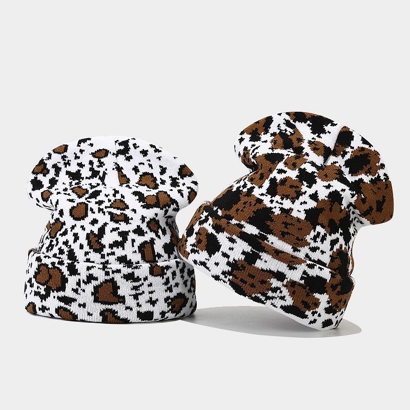 Moda europea y americana Nueva leopardo Jacquard sombrero de punto engrosado cálido hombres y mujeres otoño e invierno Gran circunferencia de la cabeza protección del oído sombrero de lana