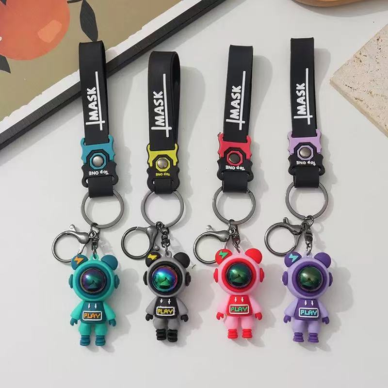 Cartoon Flash Bear Astronaut Keychain Cute astronauta bolsa bolsa colgante al por mayor centro comercial muñeca máquina al por mayor