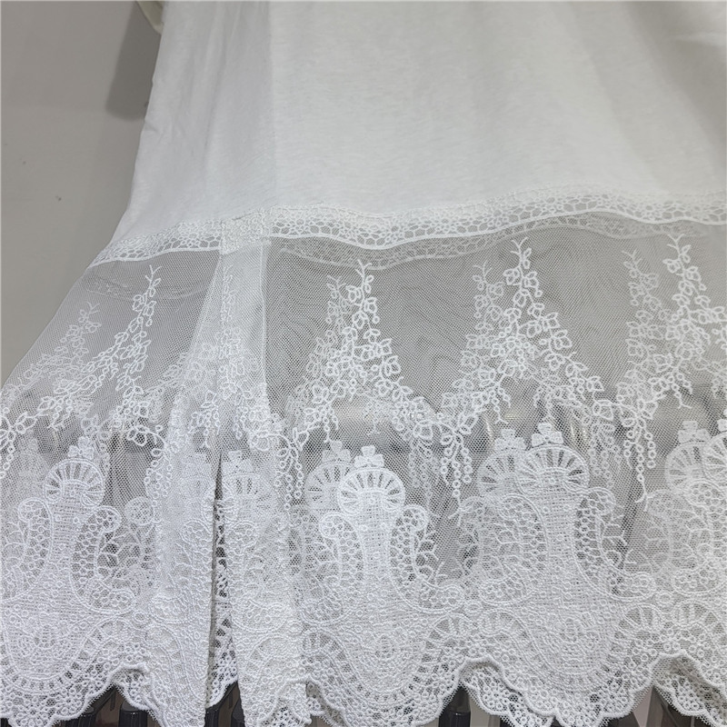 Diseño de encaje de costura camiseta de mangas cortas mujeres 2026 primavera y verano moda suelta delgada cuello redondo blusa casual universal