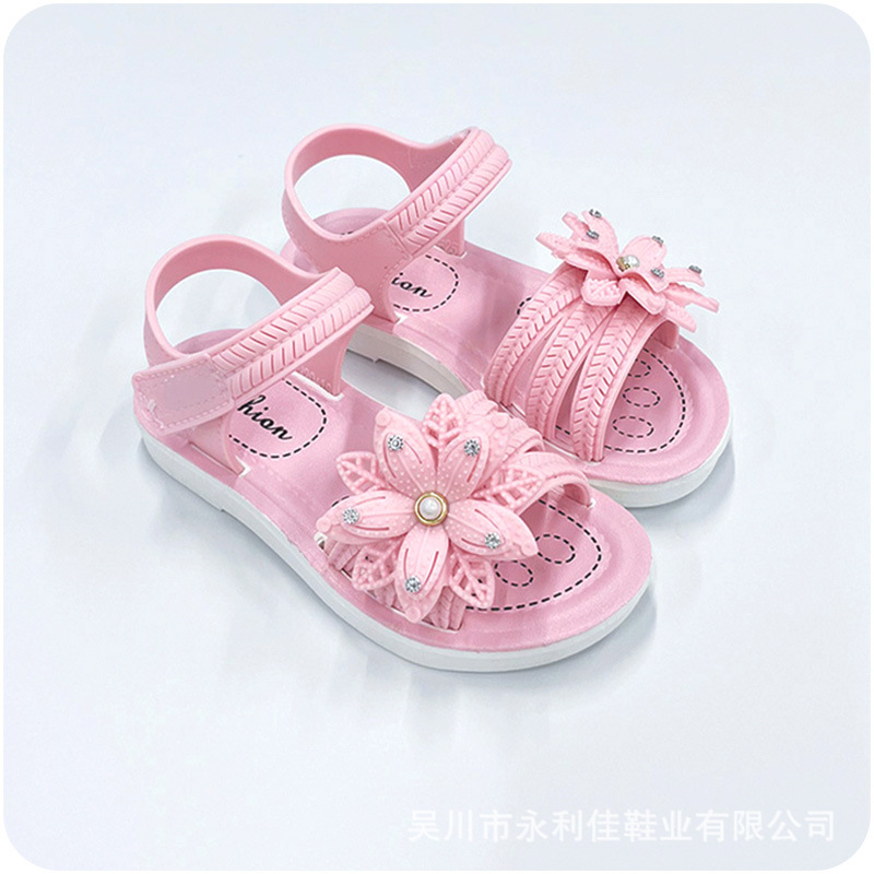 Sandalias de niñas de verano nuevas niñas pequeñas niñas bebés antideslizantes fábrica de flores al por mayor de comercio exterior