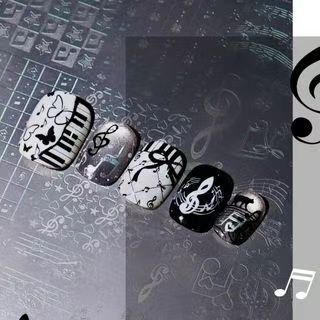 Black and white piano note press-on nails with artistic music theme and bowknot, beautiful fake nail patches, direct wholesale from cross-border factory