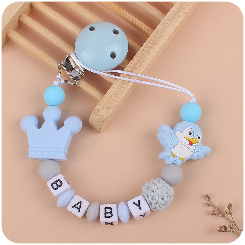 Nuevo bebé suministros de silicona chupete cadena de dibujos animados animal pájaro silicona mordedura pegamento cadena molar cadena anti-gota