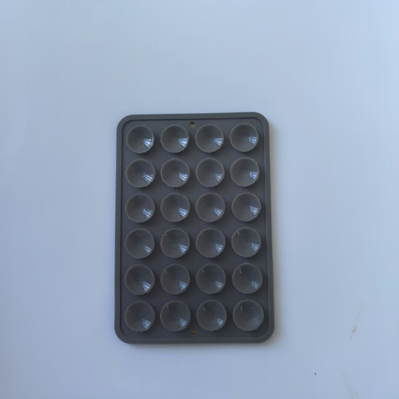 Funda de silicona antideslizante con ventosas para teléfono, 24 piezas en stock, soporte portátil móvil para teléfono, cuadrado, de silicona de una sola cara.
