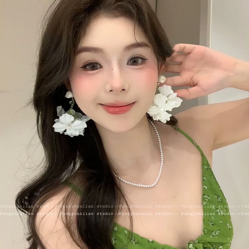 Pendientes de flores de sol de paja de estilo vacacional Pendientes de primavera y verano para mujer