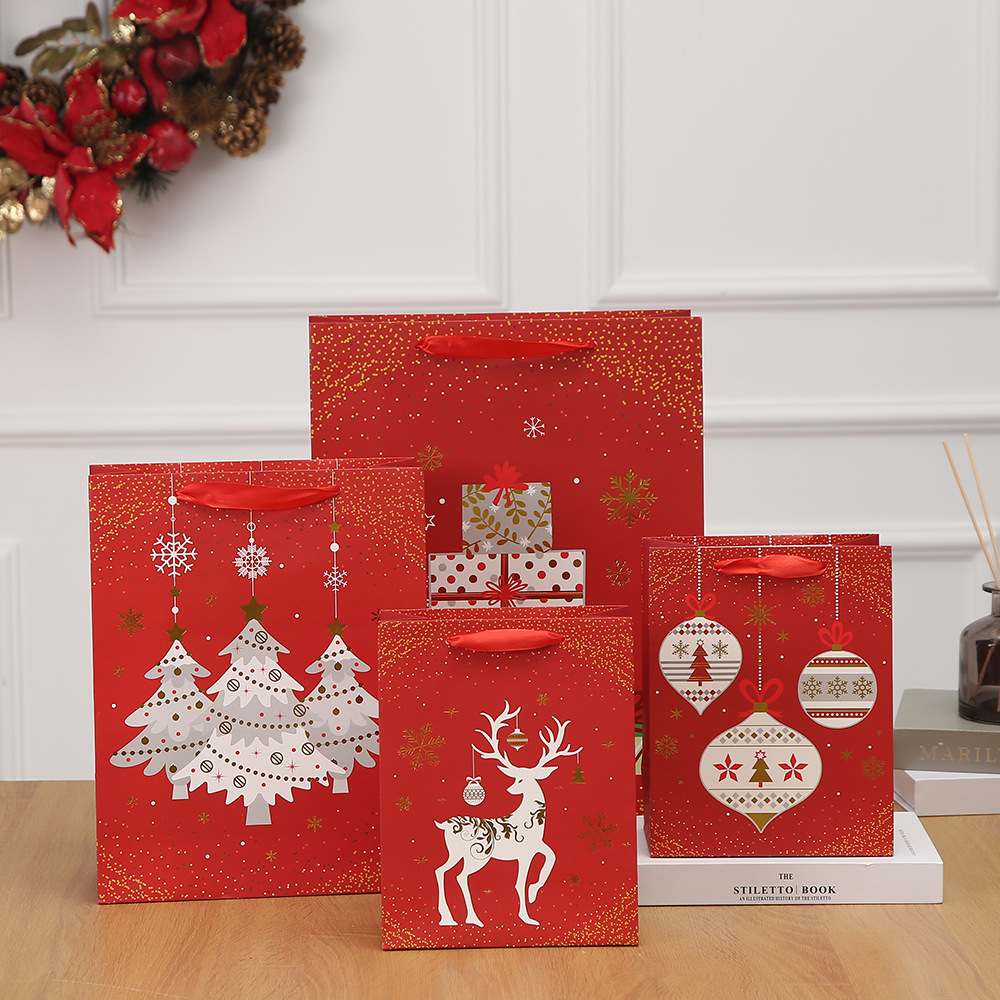 圣诞节手提纸袋礼品袋购物袋白牛皮薄款纸袋 服装购物方底礼品袋