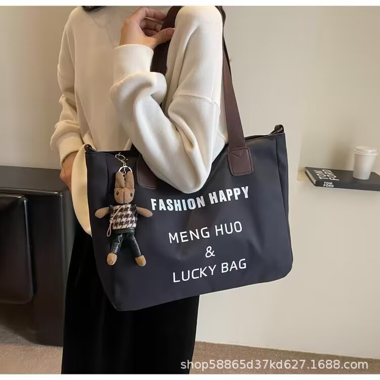 Fábrica nueva bolsa de hombro de mujer ciudad simple bolsa de mano de viaje especial de gran capacidad bolsa de trabajo de ocio de mujer