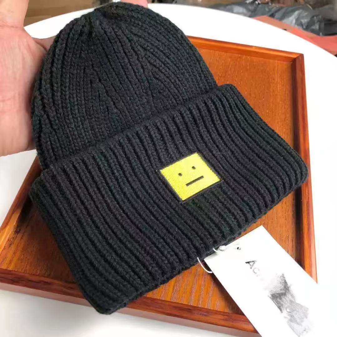 AC笑顔の帽子の四角のラベルを貼って、ウールの北欧風の冷たい帽子の韓国版のカップルの毛糸の帽子の高品質の冷たい帽子を巻きます。