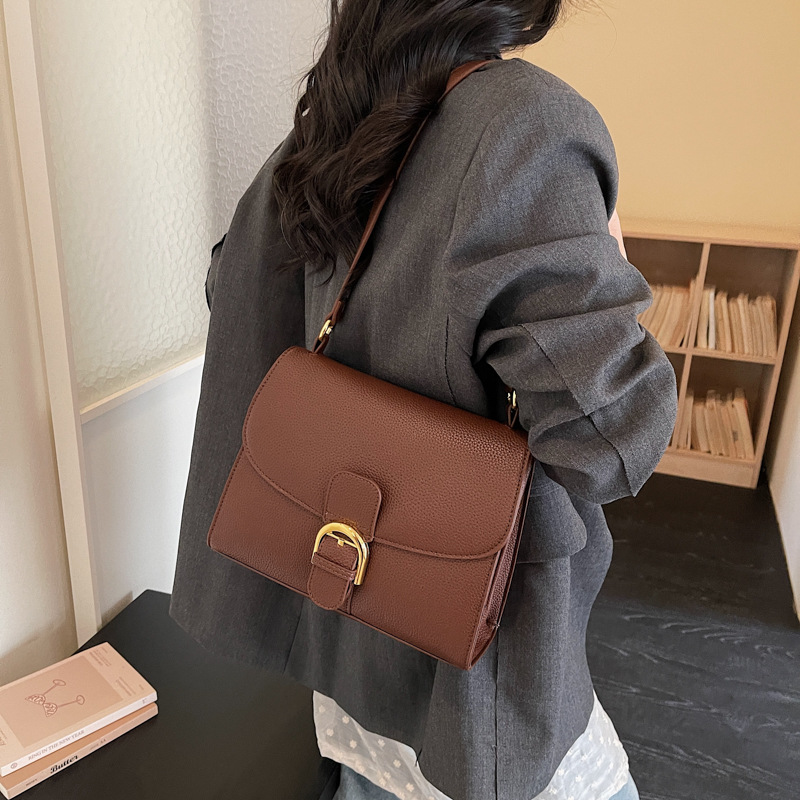 Retro nicho de diseño bolso pequeño para mujeres 2026 nuevo mochila de textura de moda simple mochila de viaje diario