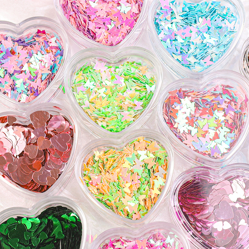 Arte de uñas Aurora mariposa lentejuelas irregulares láser corazón lentejuelas brillo de uñas color mágico accesorios de joyería en caja