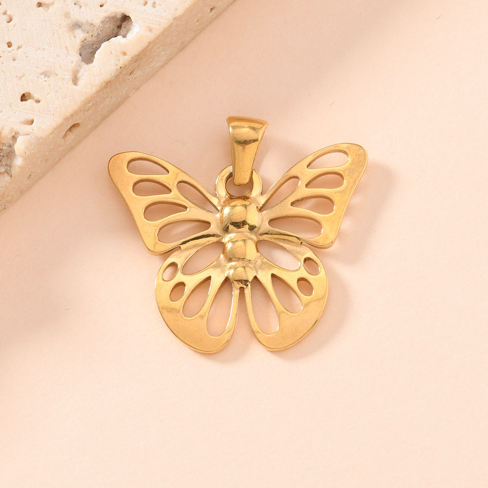 Colgante único estilo elegante arco colgante chapado 18k oro mariposa accesorios accesorios al por mayor