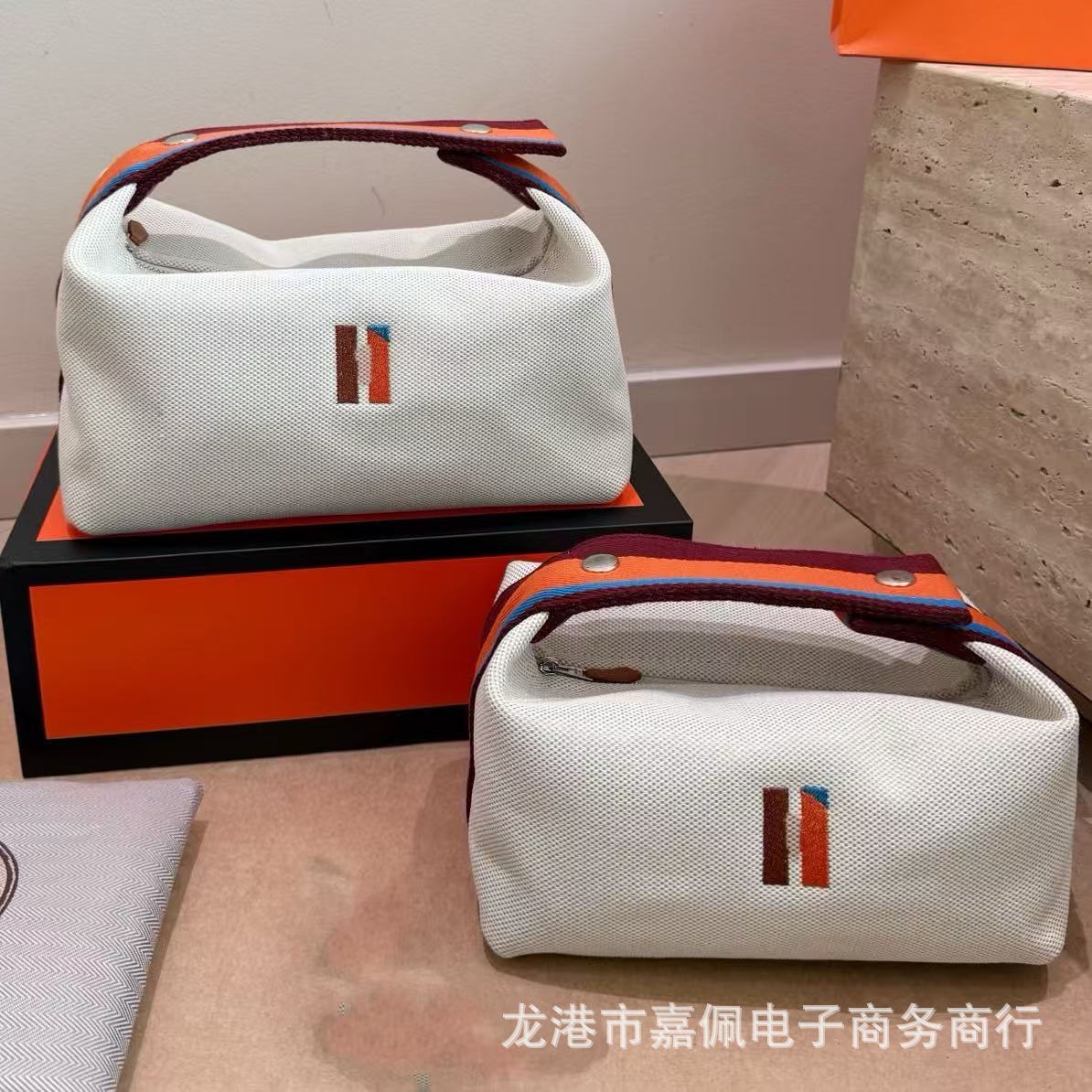 新款帆布洗漱包轻奢中古饭盒包手拎包便携式化妆包手机包