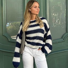 ヨーロッパとアメリカの 2025 新しい冬の女性用セーター、ラウンドネックストライプ、ゆったり、怠惰で多用途な女性用長袖ニットセーター