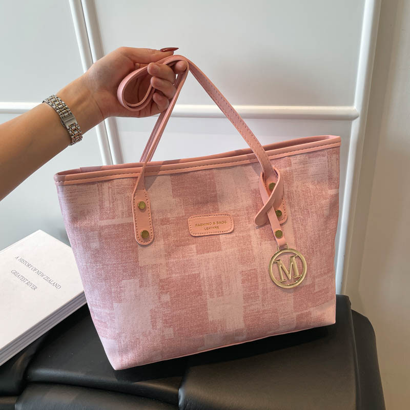 Bolsa grande 2026 nueva pequeña fresca mochila de viaje al trabajo, gran capacidad de bolsas de mano de alta popularidad este año