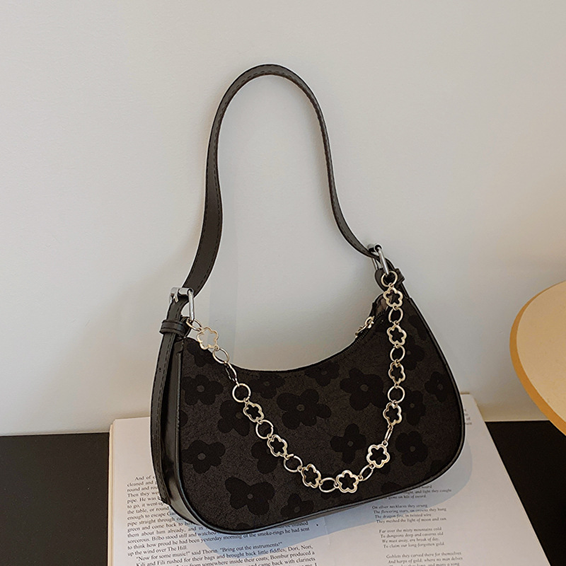 Bolso de las axilas para las mujeres 2023 nuevo bolso de mensajero de hombro de moda nicho retro ins baguette bolsa de tela tejida de encaje