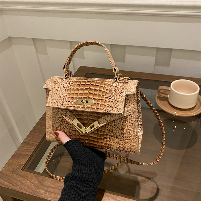 Bolso de mano con textura de nicho francés 2025 nuevo bolso femenino moda simple bolso de mensajero arte popular Kylie