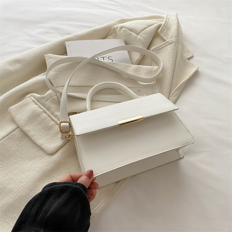 Este año la nueva explosión de bolsos de mujer de alta calidad sensación extranjera bolsos de mano versátiles ligeros de lujo nicho bolsos de hombro de un solo hombro