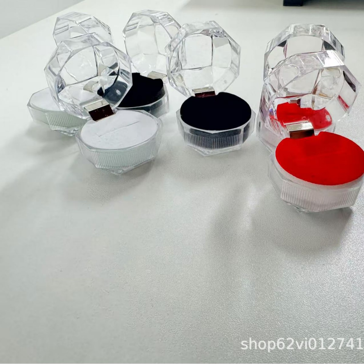 Caja de cristal transparente con tapa plegable pequeña caja de embalaje de pernos de anillo octogonal caja de joyería acrílica joyería caja de almacenamiento